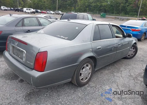 2003 Cadillac Deville Standard z USA, uszkodzony, nr VIN 1G6KD54Y63U242009